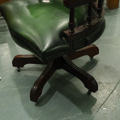 3104 - Mahogany and green leather button back swivel office chair. Not available for in-house P&P, contact ... 