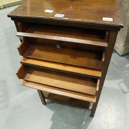 3116 - An Edwardian walnut music cabinet of four drawers, 52 x 37 x 101 cm H. Not available for in-house P&... 