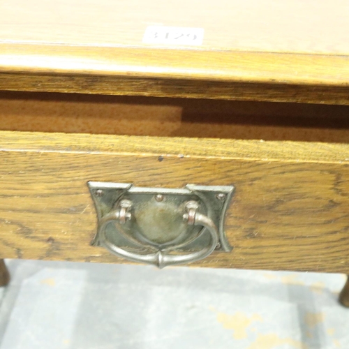 3129 - A late 19th century oak single drawer side table with a bronze Art Nouveau swing handle, 76 x 50 x 7... 