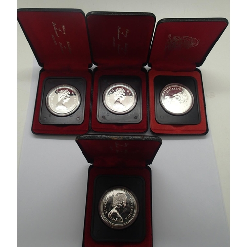 3115 - Four cased 1976 Canadian silver proof dollars. P&P Group 1 (£14+VAT for the first lot and £1+VAT for... 