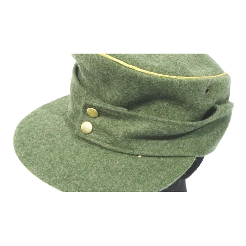 2105 - German WWII re-enactment SS Panzer Division cap, and M35 ski cap (2). P&P Group 2 (£18+VAT for the f... 