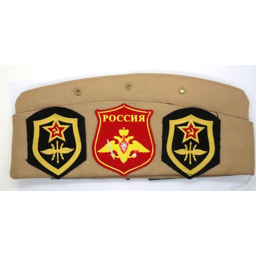 2201 - Russian cap with mixed badges. P&P Group 2 (£18+VAT for the first lot and £3+VAT for subsequent lots... 