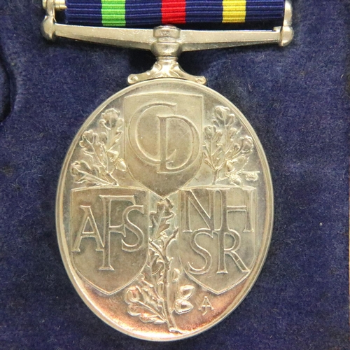 2243 - British Civil Defence Long Service medal in original presentation case. P&P Group 1 (£14+VAT for the... 