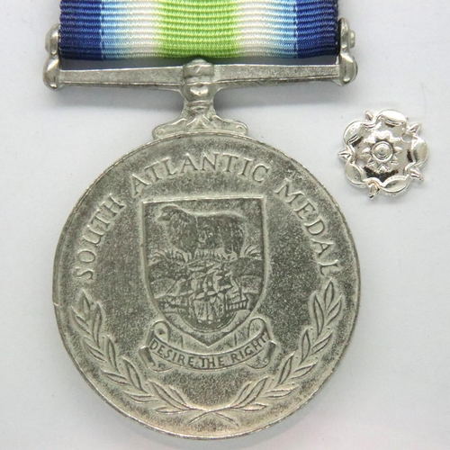 2251 - Probable reproduction South Atlantic medal and rosette. P&P Group 1 (£14+VAT for the first lot and £... 