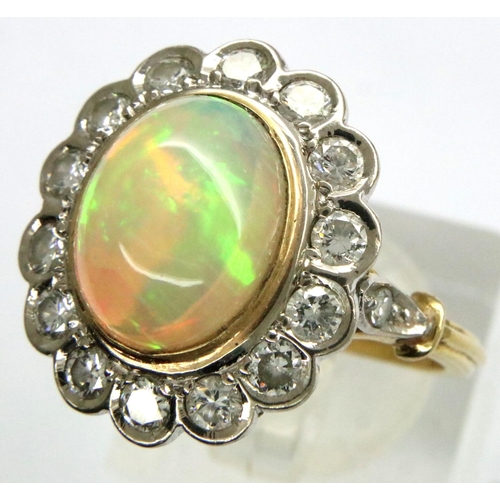 61 - 18ct gold opal and diamond cluster ring, size Q, 6.6g. P&P Group 1 (£14+VAT for the first lot and £1... 