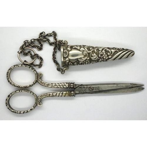 107 - Hallmarked silver scissors and case, London assay, 35g. P&P Group 1 (£14+VAT for the first lot and £... 