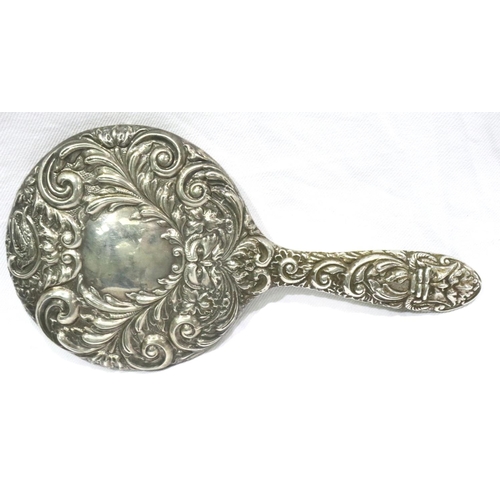 109 - Ornate silver hand mirror, L: 23 cm. P&P Group 2 (£18+VAT for the first lot and £3+VAT for subsequen... 