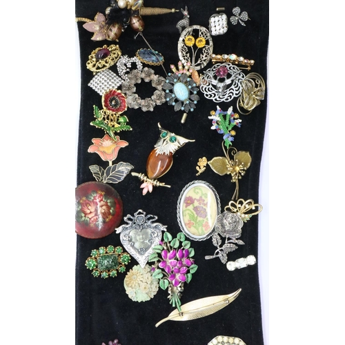 69 - Fifty mid 20th century costume brooches including silver examples. P&P Group 2 (£18+VAT for the firs... 