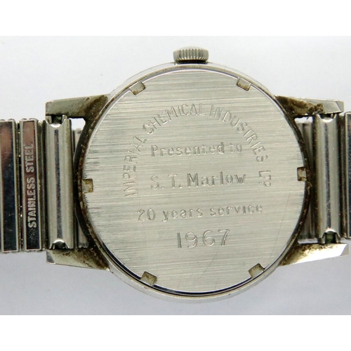 83 - Garrard: 1960s gents manual wind steel cased wristwatch on expanding bracelet, ICI inscription to ba... 