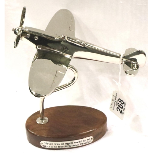 268 - Chrome Spitfire on wooden base, wingspan 22 cm. P&P Group 2 (£18+VAT for the first lot and £3+VAT fo... 