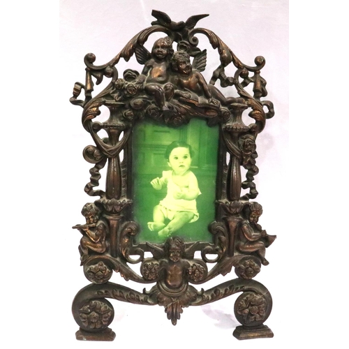 270 - Vintage metal photograph frame with Cherub decoration, H: 37 cm. P&P Group 3 (£25+VAT for the first ... 