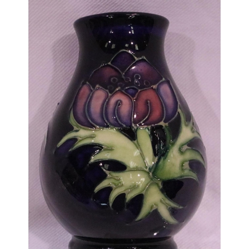 212 - Moorcroft bulbous blue ground vase, in the Pansy pattern, H: 10 cm. No chips, cracks or visible rest... 