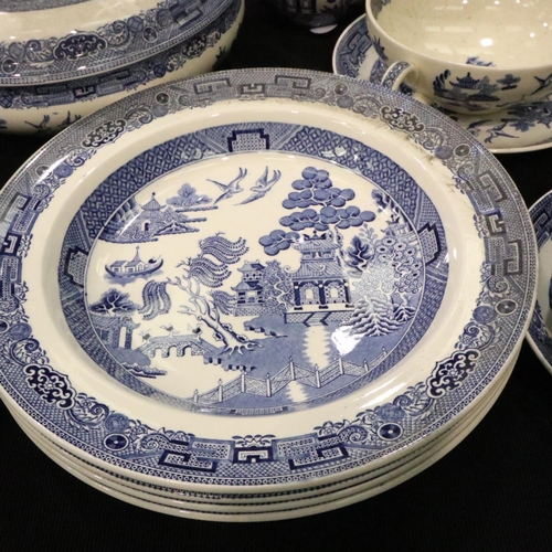 213 - Quantity of Wedgwood ceramics in the Willow pattern including tureens. No cracks, chips or visible r... 