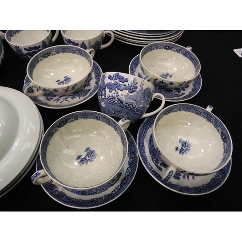 213 - Quantity of Wedgwood ceramics in the Willow pattern including tureens. No cracks, chips or visible r... 