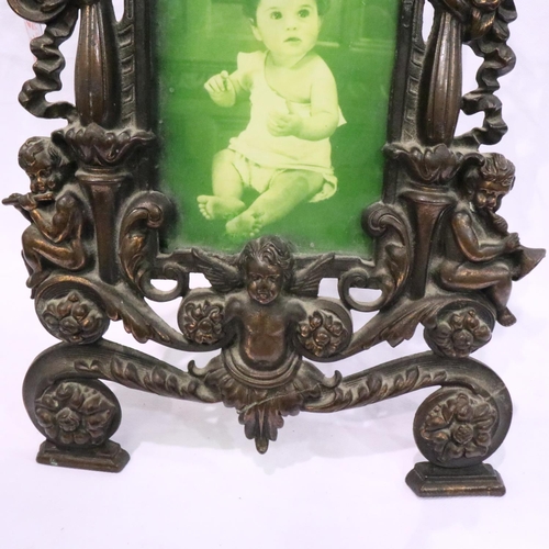 270 - Vintage metal photograph frame with Cherub decoration, H: 37 cm. P&P Group 3 (£25+VAT for the first ... 