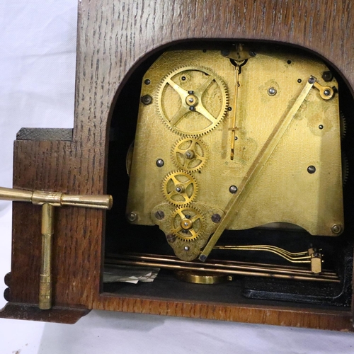 273 - Two oak cased chiming mantel clocks; Elliott and Garrard. Largest H: 23 cm, lacking pendulum. P&P Gr... 