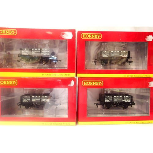 2195 - Four Hornby R6667 E Marsh, four plank open wagons. Excellent condition, boxes with storage wear. P&P... 