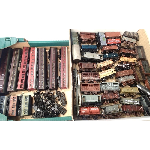 2078 - Approximately forty unboxed OO scale wagons, mostly weathered and ten coaches. Mostly for spares and... 