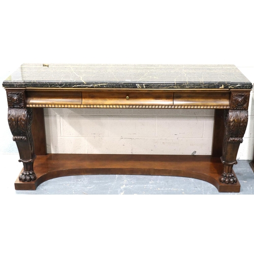 3114 - Henredon: a substantial modern American Empire style console table having heavily carved supports, s... 