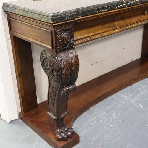 3114 - Henredon: a substantial modern American Empire style console table having heavily carved supports, s... 