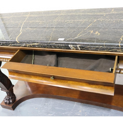 3114 - Henredon: a substantial modern American Empire style console table having heavily carved supports, s... 