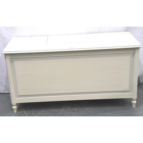 3121 - A modern bedding style chest, incorporating a lift mechanism for stereo system, European two pin plu... 