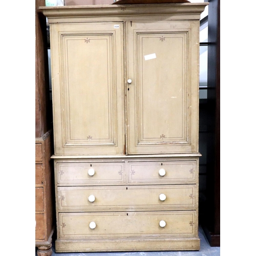 3124 - A Victorian pine linen press with a chest base of two short above two long drawers, the cupboard fit... 