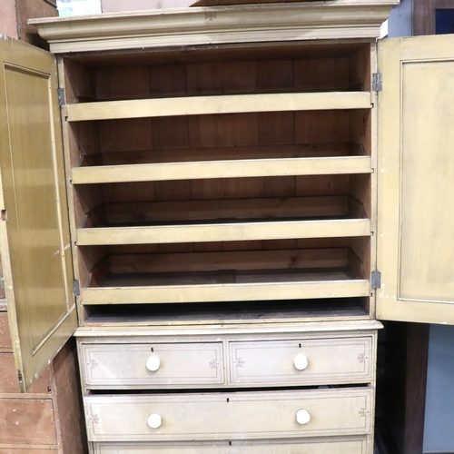 3124 - A Victorian pine linen press with a chest base of two short above two long drawers, the cupboard fit... 