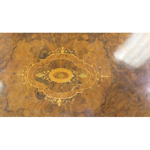 3133 - A late 19th century inlaid walnut lamp table, with restored oval top and carved tripod support H: 62... 