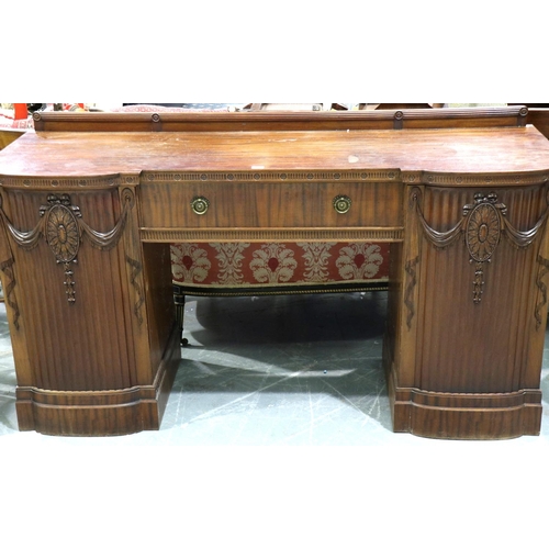 3138 - A regency period twin pedestal sideboard, having a single drawer flanked by carved and gadrooned cup... 