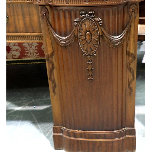 3138 - A regency period twin pedestal sideboard, having a single drawer flanked by carved and gadrooned cup... 