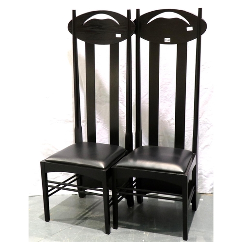 3140 - A pair of contemporary black ash high-back hall chairs, each with black leather seat pad, H: 137 cm.... 