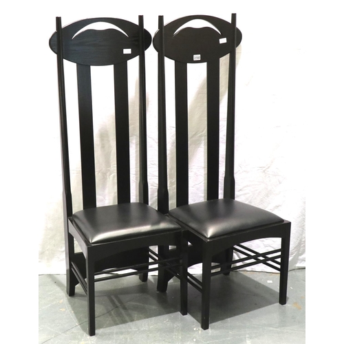 3140 - A pair of contemporary black ash high-back hall chairs, each with black leather seat pad, H: 137 cm.... 