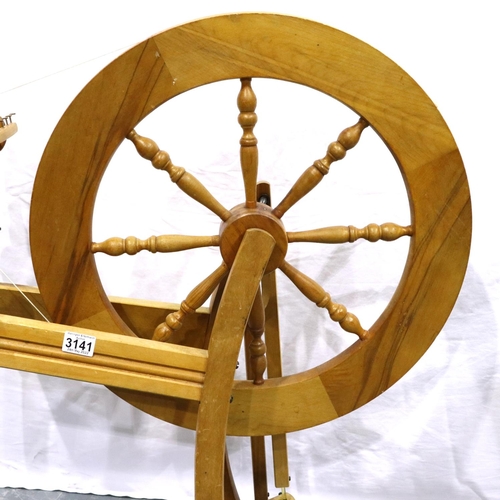 3141 - An Ashford beech spinning wheel, overall H: 85 cm. Not available for in-house P&P, contact Paul O'He... 