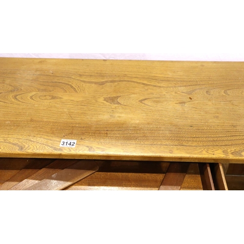 3142 - An Ercol golden dawn elm sideboard of three short drawers and two cupboard doors, H: 155 x 45 x 68 c... 