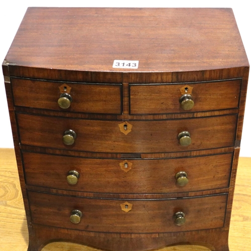 3143 - A Georgian diminutive chest of two-short above three-long drawers, possibly an apprentice piece, som... 