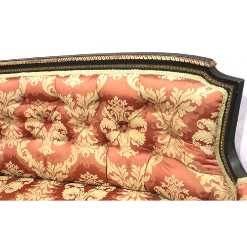 3146 - A Victorian ebonised and gilt salon settee, more recently upholstered with buttoned back. Not availa... 