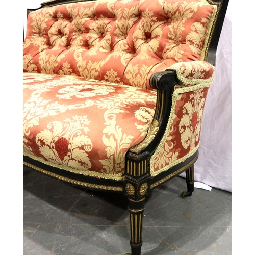 3146 - A Victorian ebonised and gilt salon settee, more recently upholstered with buttoned back. Not availa... 