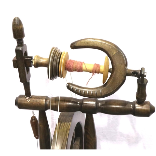 3147 - A 20th century stained pine spinning wheel, overall H: 104 cm. Not available for in-house P&P, conta... 