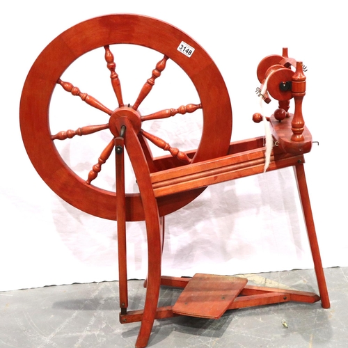 3148 - An Ashford red-stained beech spinning wheel, overall H: 85 cm. Not available for in-house P&P, conta... 