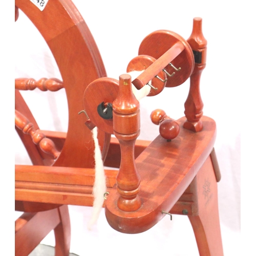 3148 - An Ashford red-stained beech spinning wheel, overall H: 85 cm. Not available for in-house P&P, conta... 