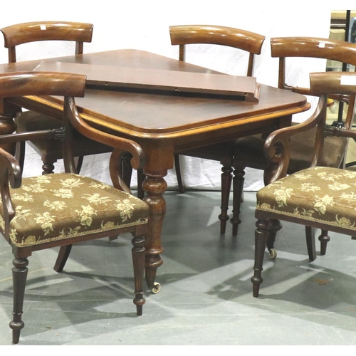 3160 - A Victorian mahogany wind out extending dining table with additional leaf, with a set of six regency... 