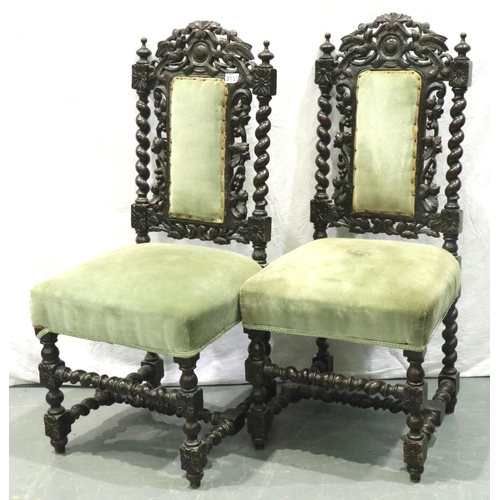 3161 - A pair of Victorian Jacobean revival carved chairs displaying birds amongst foliage, each H: 106 cm.... 