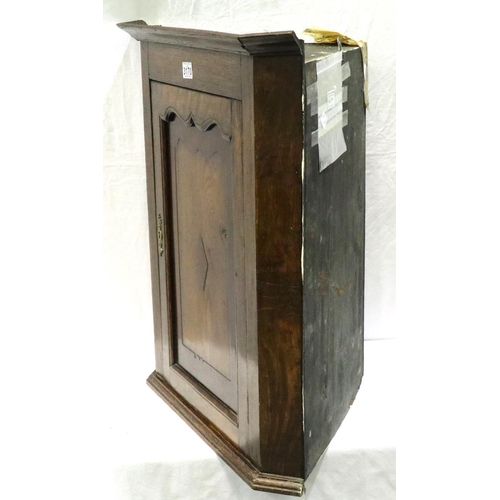 3170 - George III oak corner cupboard of small proportions with two shelves and key. Not available for in-h... 