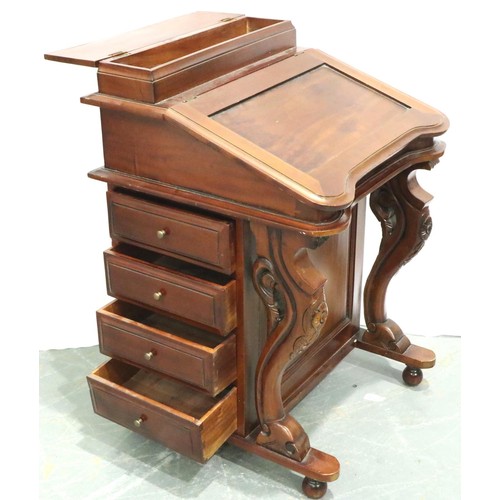 3173 - A modern hardwood Davenport desk, having eight short drawers and fitted interior, 55 x 55 x 83 cm H.... 