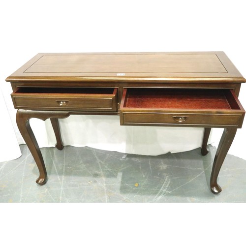 3174 - Contemporary Chinese rubberwood two drawer desk on shaped supports, 122 x 45 x 80 cm H, with a simil... 