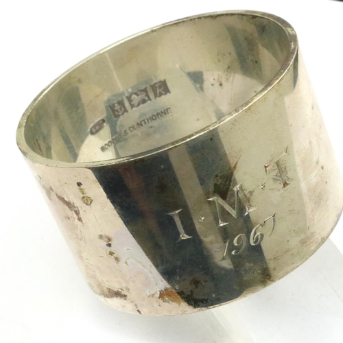 117 - Hallmarked silver napkin ring in a Boodle & Dunthorne presentation box, Birmingham assay 1967, with ... 