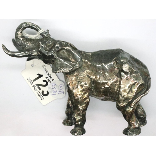 123 - White metal elephant, L: 13 cm, (tests as low grade silver). P&P Group 1 (£14+VAT for the first lot ... 