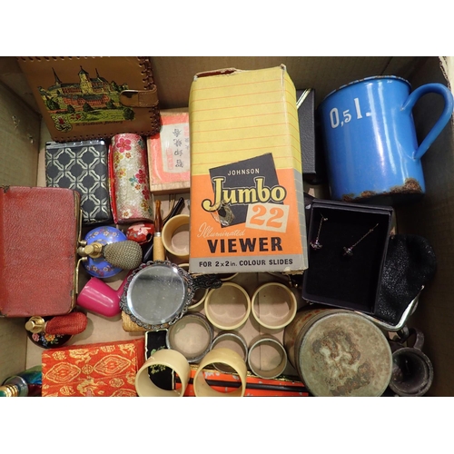 1074 - Box of mixed collectables to include pipes, perfume bottles, napkin rings etc. Not available for in-... 