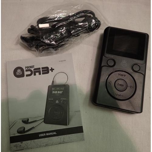 1075 - Pocket DAB radio with headphones and charging cable; working at time of lotting. P&P Group 1 (£14+VA... 